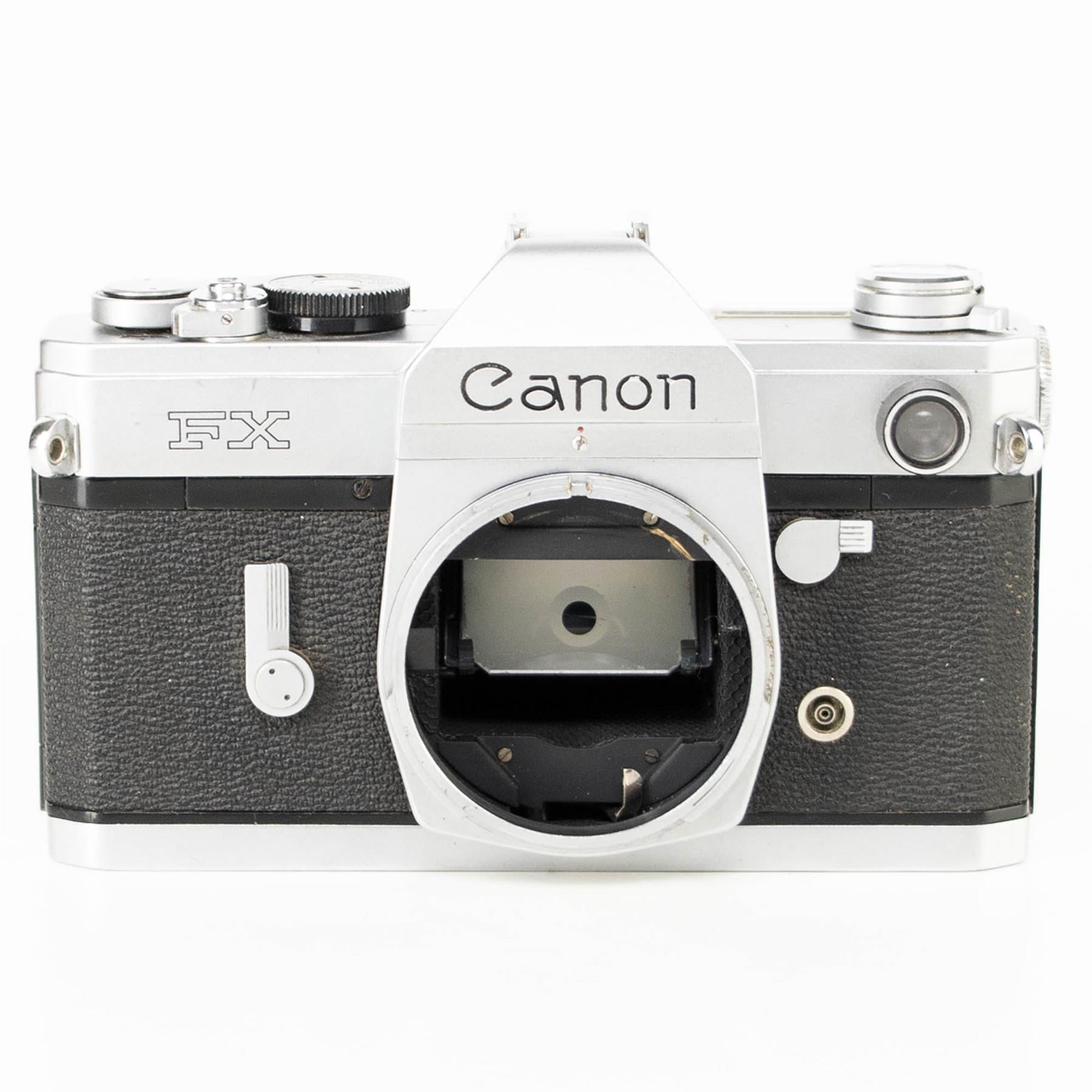 Canon FX Camera | Canon FL 50mm f1.8 lens | White | Japan | FD mount | 1964