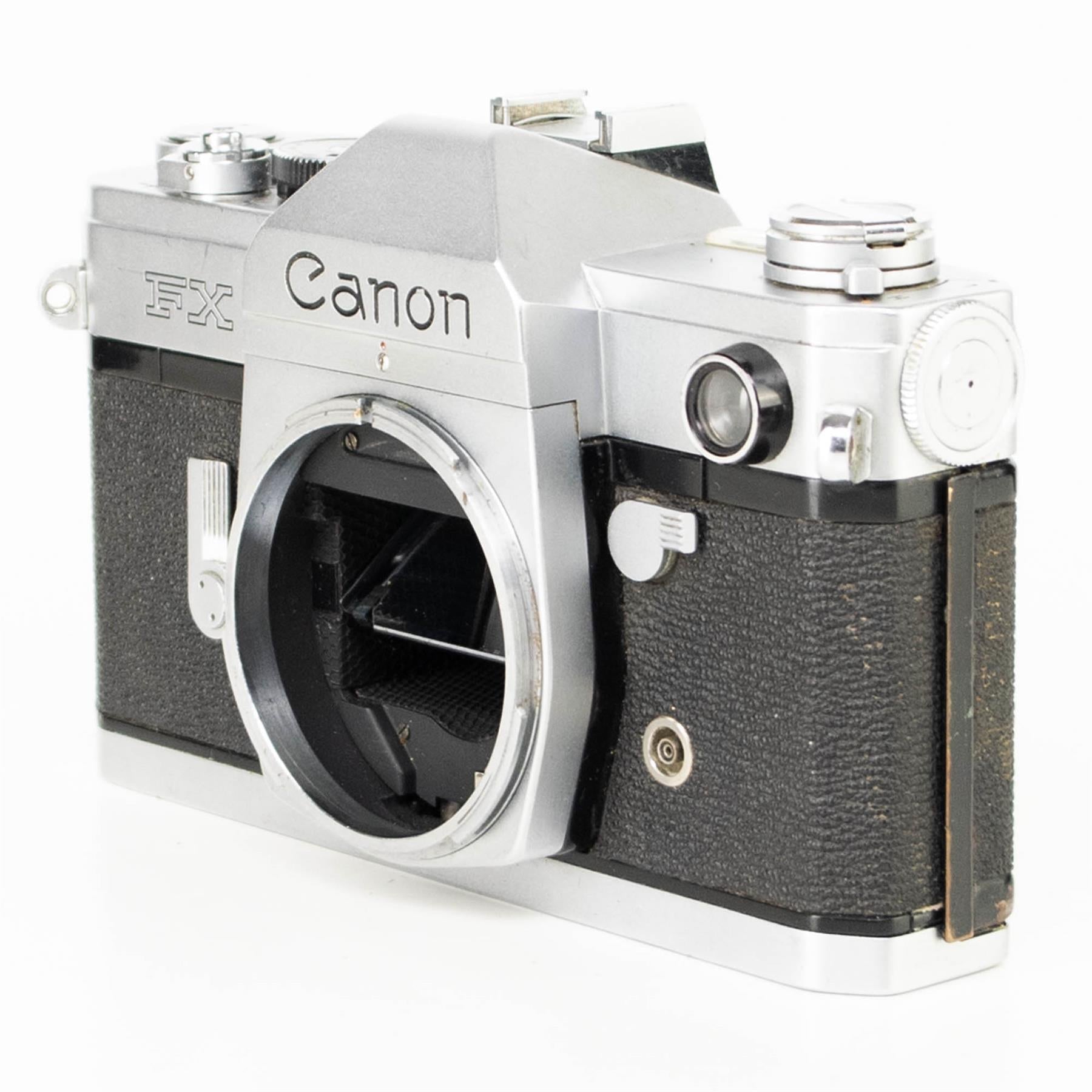 Canon FX Camera | Canon FL 50mm f1.8 lens | White | Japan | FD mount | 1964