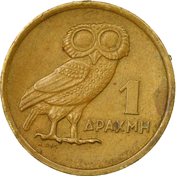 Greek coins with famous figures and ancient symbols